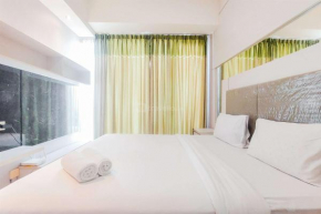 Spacious and Comfy 1BR Tree Park City BSD Apartment By Travelio